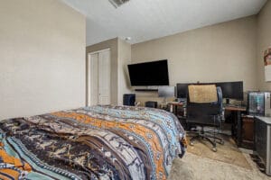 Guest bedroom in this move-in-ready East Mesa home