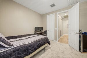 Spacious guest bedroom with natural light in a Cadence at Gateway home