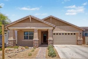 Curb appeal and front entry of a Cadence at Gateway home for sale in Mesa