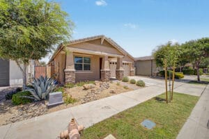Single-level home with desert landscaping in Cadence at Gateway, Mesa