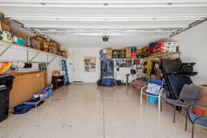 Two-car garage with professional shelving in a Cadence at Gateway home