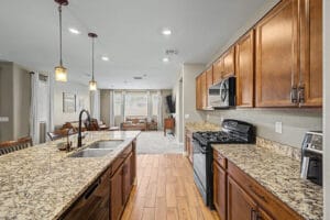 Kitchen open to the great room in a Cadence at Gateway home for sale in Mesa