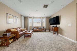 Spacious living area with new flooring in this move-in-ready East Mesa home