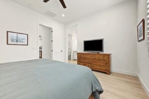 Furnished fourth bedroom with ceiling fan