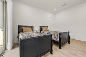 Furnished bonus room with wood-like vinyl plank flooring