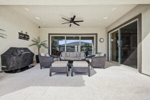 Large covered patio overlooking the heated pool and putting green at 1255 E Mead Dr, Gilbert, AZ