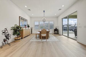 Open great room with modern furnishings and 12-foot ceilings