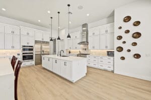 Kitchen with statement pendant lights over the islands